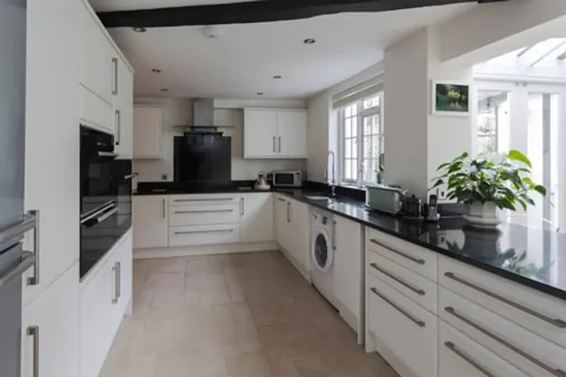 Bright, fully remodeled kitchen and living space completed by Unlimited Services LLC in Stamford, Connecticut