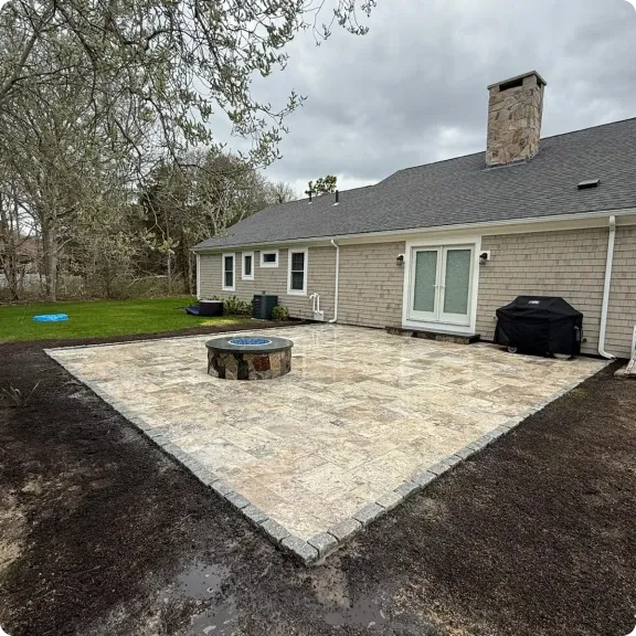 Outdoor living space built by Bridi Masonry on Cape Cod