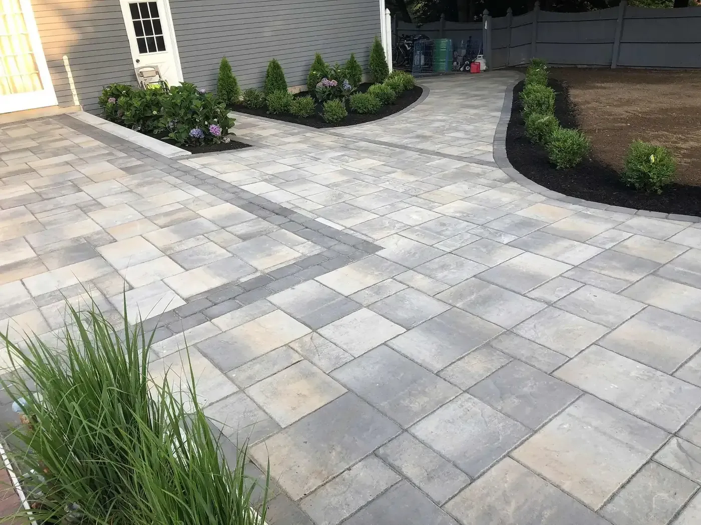 Paver patio with curved planting-bed edging
