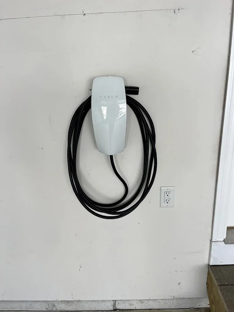 Electrical vehical charging plug and outlet installed for EV charging