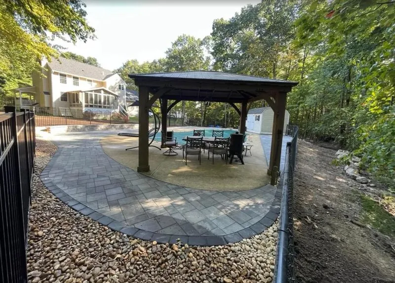 Ultimate Poolside Paradise: Stunning 1600 Sq Ft Patio & Classic New England Stone Wall Transformation by Martin's Landscaping & Construction