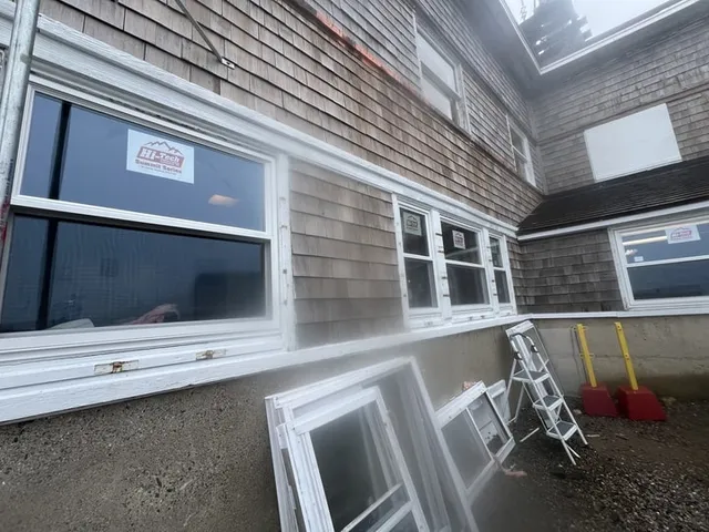 Window replacement in progress, Hi-Tech Summit Series units installed