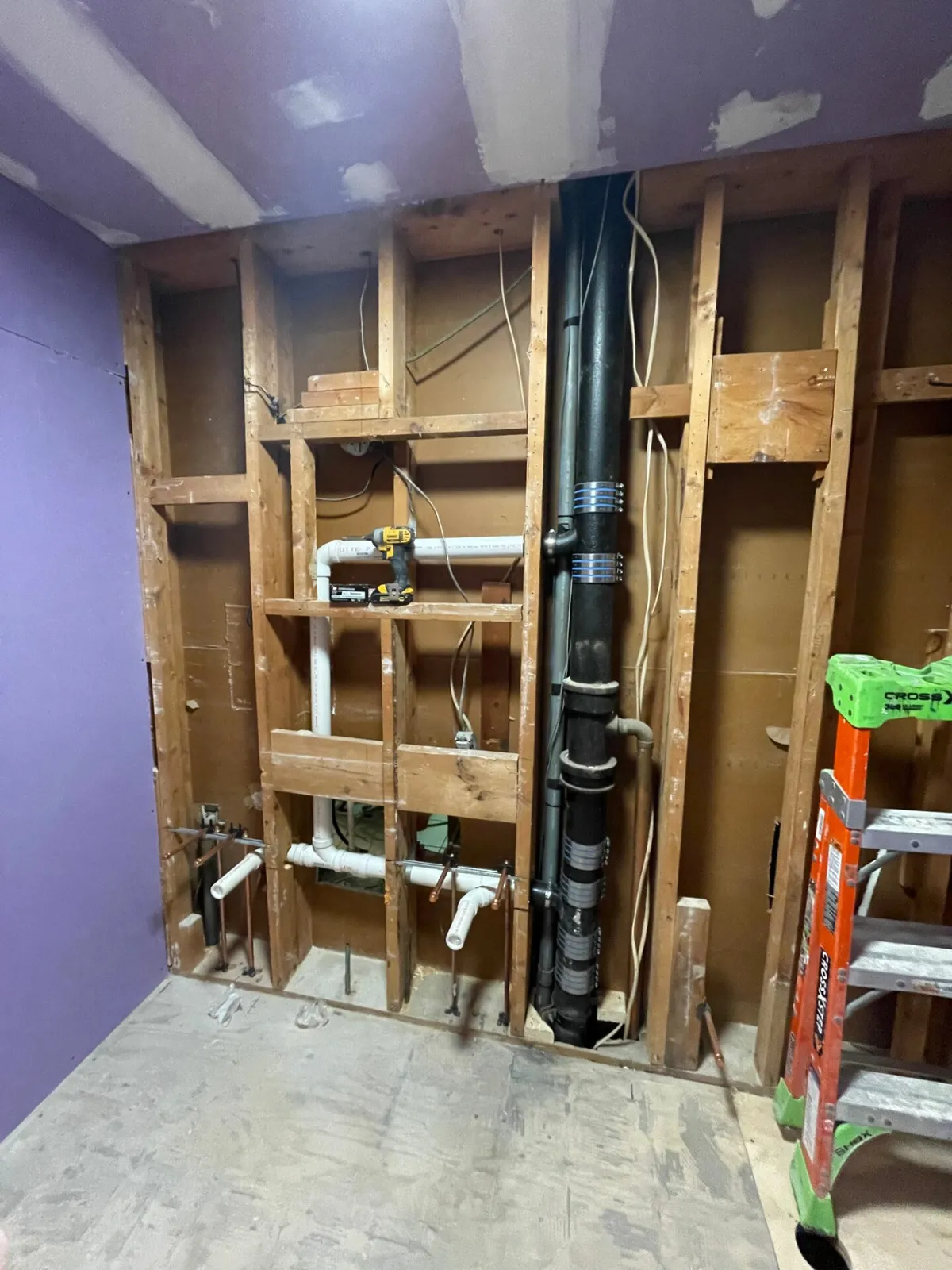 Updated plumbing installation for a bathroom remodel in Lowell, MA by Top Shelf Plumbing & Heating