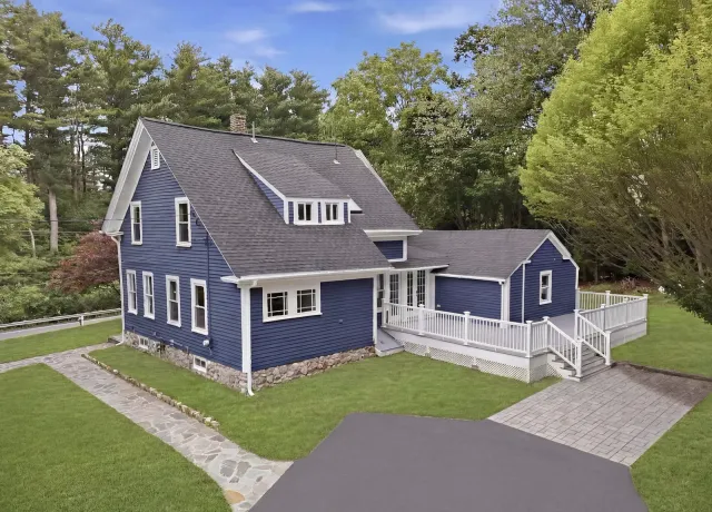 Professionally staged final exterior after whole-house renovation in Wayland Massachusetts