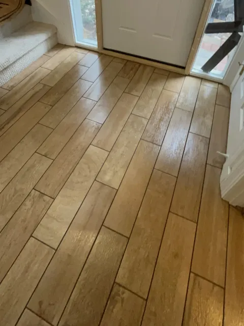 Wood-look porcelain plank floor in an entryway