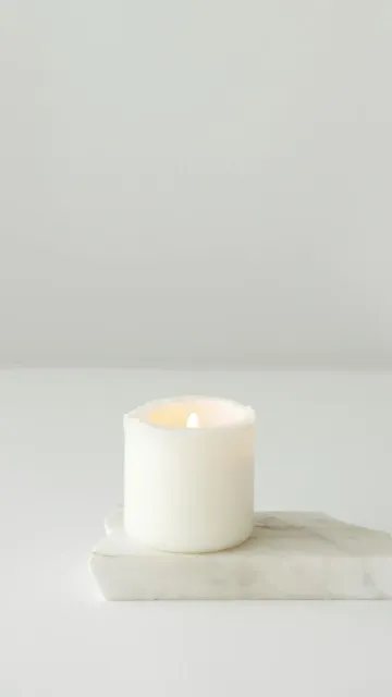 Non-toxic candle in home cleaned by Polish and Brine residential cleaning services
