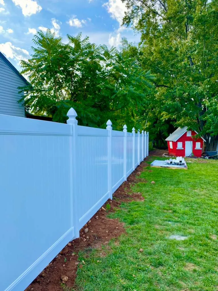 White vinyl fence installation