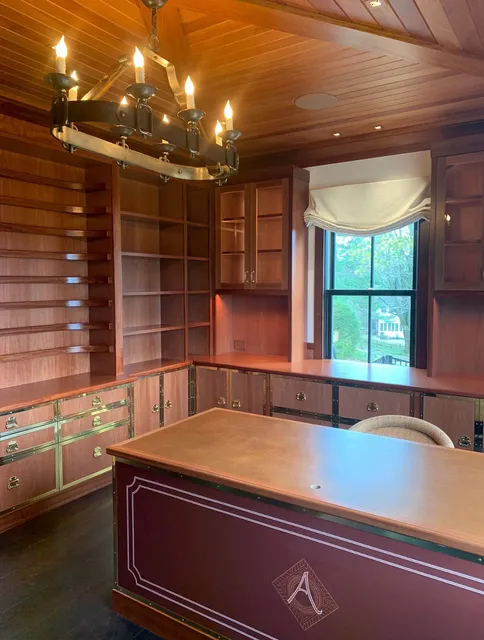 An office fit for a king.

Warm wood on the ceiling, leather under hand, and custom brass catching just enough light.

Understated, but impossible to ignore. A room that carries presence without trying too hard. 

#echelonbuilders #customhomes #luxuryinteriors #homeofficeinspo #millworkdesign