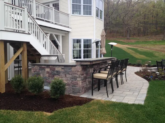 Deck with bar, grill, and patio
