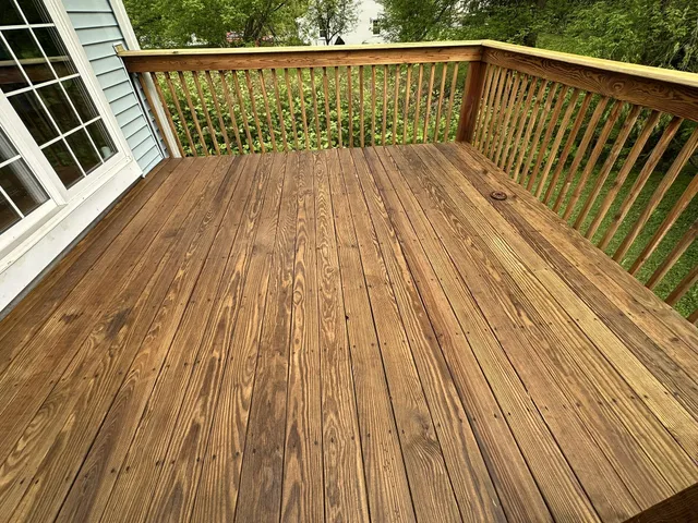 Wood deck cleaned and freshly stained after Eagle's deck cleaning