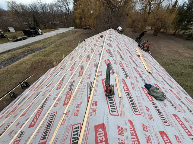 Metal roof underlayment and strapping installed