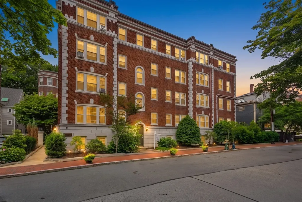 Private showings only. This sun-filled corner unit at Bowdoin Court features lovely hardwood flooring, restored windows, a large living room with a fireplace, and 2 bedrooms nestled between Harvard and Porter Square in renowned Radcliffe neighborhood. This 4-story Harlow-designed brick building circa 1920 was converted to condos in 1977, and is just steps to restaurants, cafes, public transit, and major employers and educators. The building is professionally managed and monthly HOA fee includes heat, hot water, water/sewere, snow removal, landscaping, trash removal, master insurance, and common area maintenance.This unit will require plumbing repair to properly restore water to the bathroom, and the kitchen will need renovating to bring it up to building ceiling (~$1000/sf). Perfect owner occupant or investment. Building-wide phased plumbing stack project to be completed in at time TBD by association.
