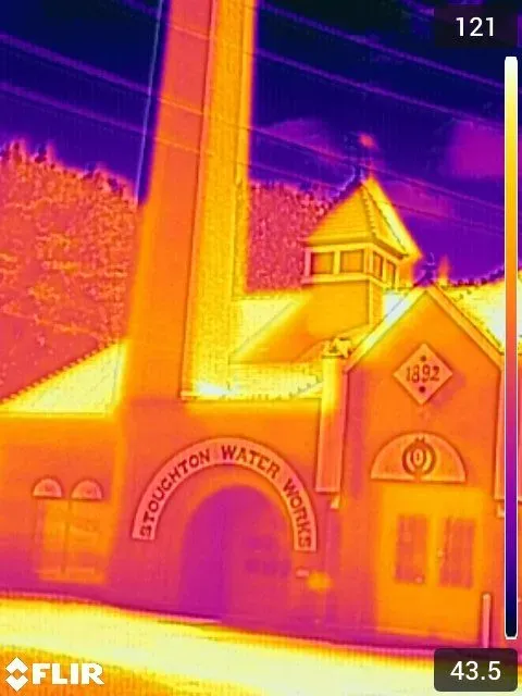 Thermal imaging of Stoughton Water Works building, showcasing temperature variations in the structure.