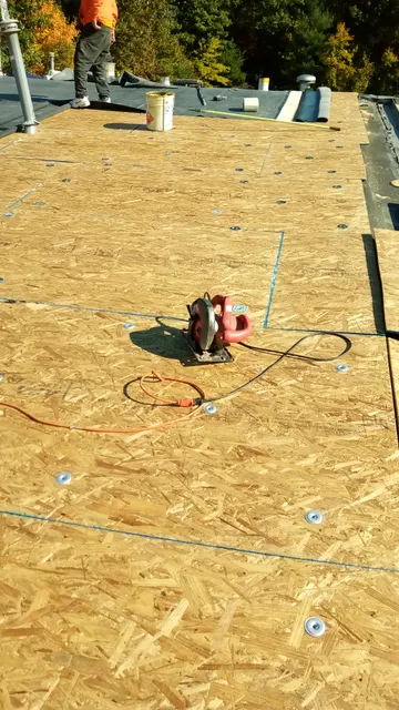 Red Roofing and Gutters work photo