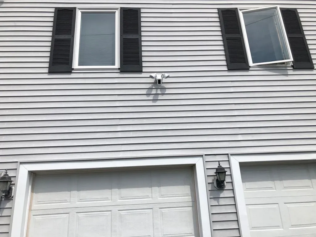 Security floodlight above a garage
