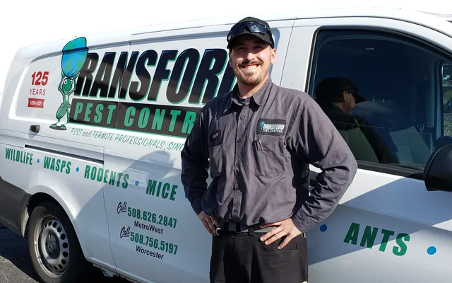 Ransford employee in front of Ransford-branded Van