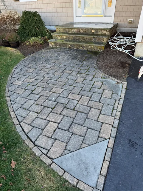 Paver walkway before professional exterior cleaning