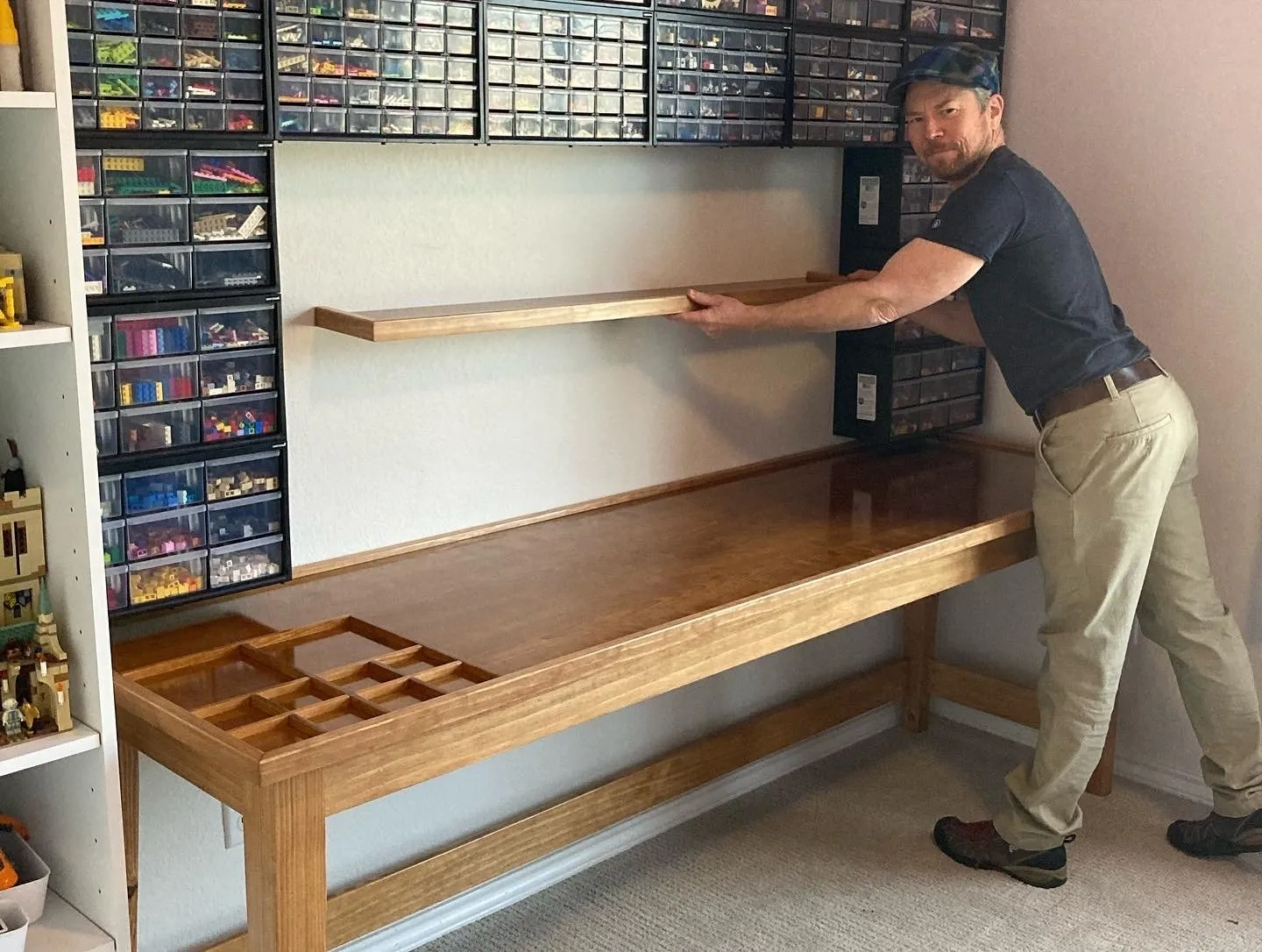 Austin installing matching shelf for Lego table