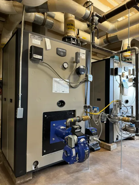 Replacement of Boilers, Tankless Water Heaters and Pumps at large multi-use facility in Manchester, NH.