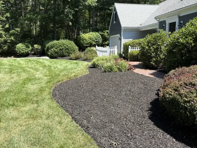 Fresh mulch beds by Vincenti Landscaping
