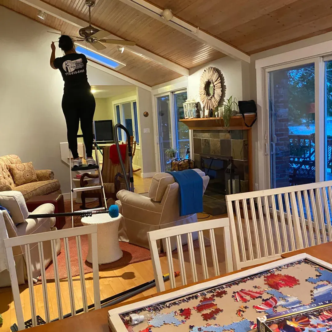 Sentinel team performing ceiling and overhead cleaning