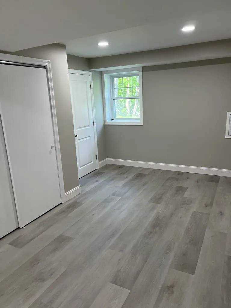 Finished Basement with Professional Door and Window Installation