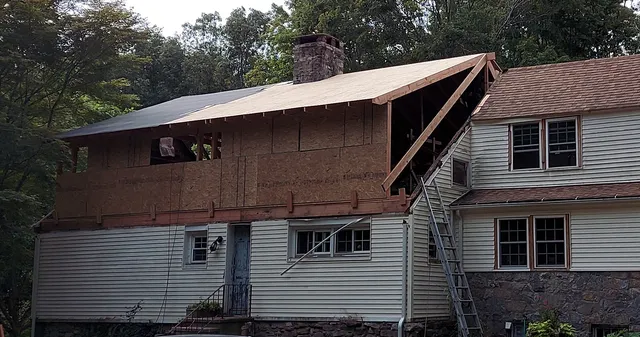 work photo from manolyroofing-ct.com