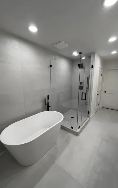 Freestanding tub & glass shower — Reno Art Construction project