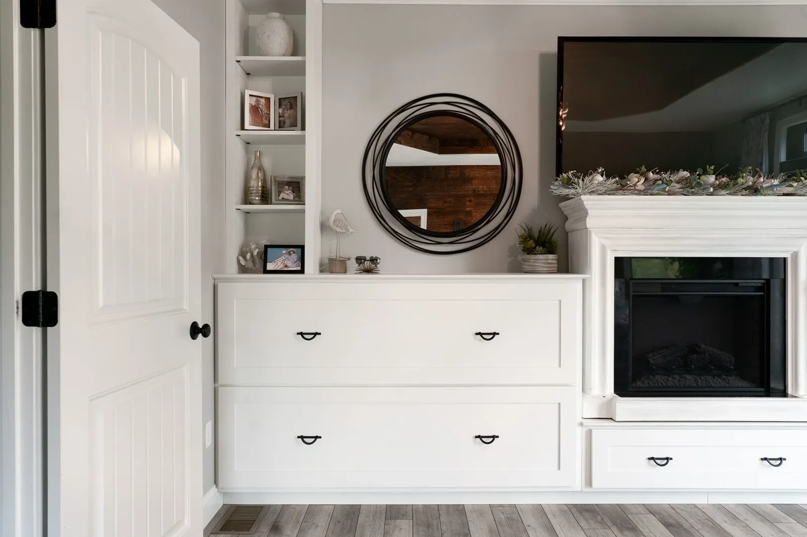 Custom Built-In drawers and a fireplace mantel; we built for clients of ours in their bedroom