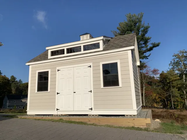 Carriage House Fiber-Cement Siding in Marlborough, MA - professional siding project by Maia Construction licensed Massachusetts contractor