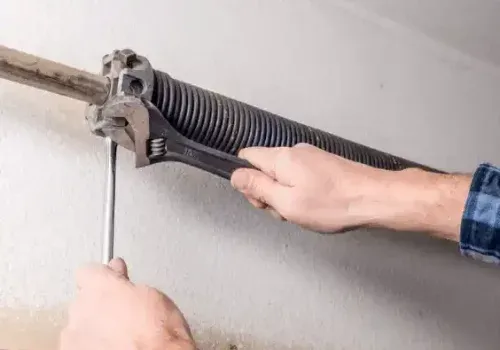repairing garage door spring