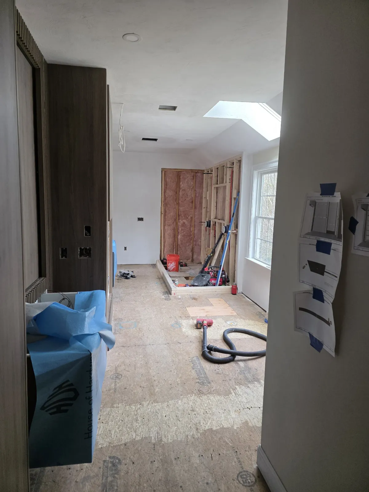 Bathroom before tile renovation with walls and floor under construction