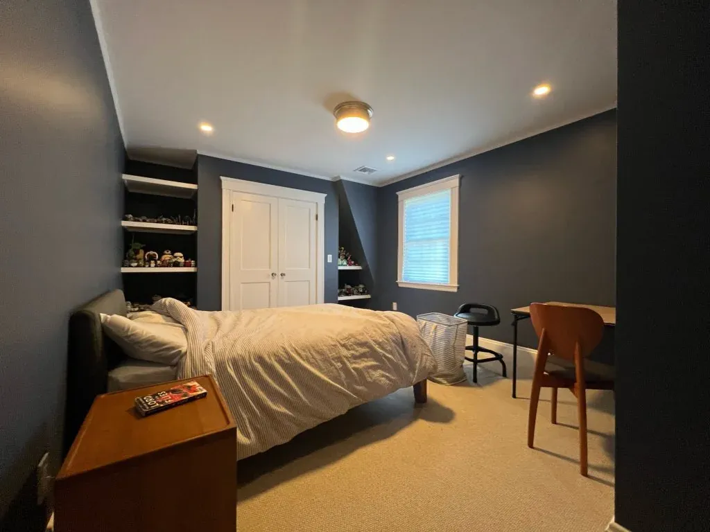 Completed dark painted bedroom by Gallagher Painting