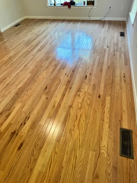Room view of newly installed hardwood flooring in Merrimack
