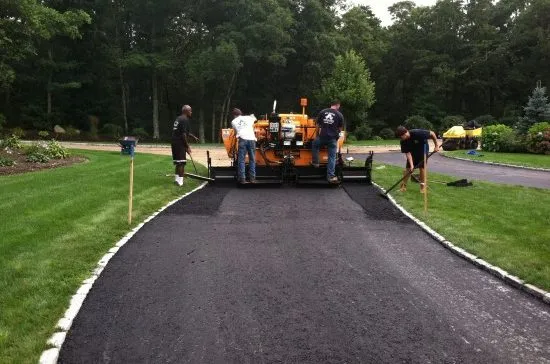 A&A Paving new driveway with stone border