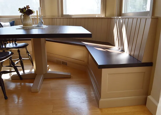 Custom built-in banquette seating designed for a comfortable dining nook.