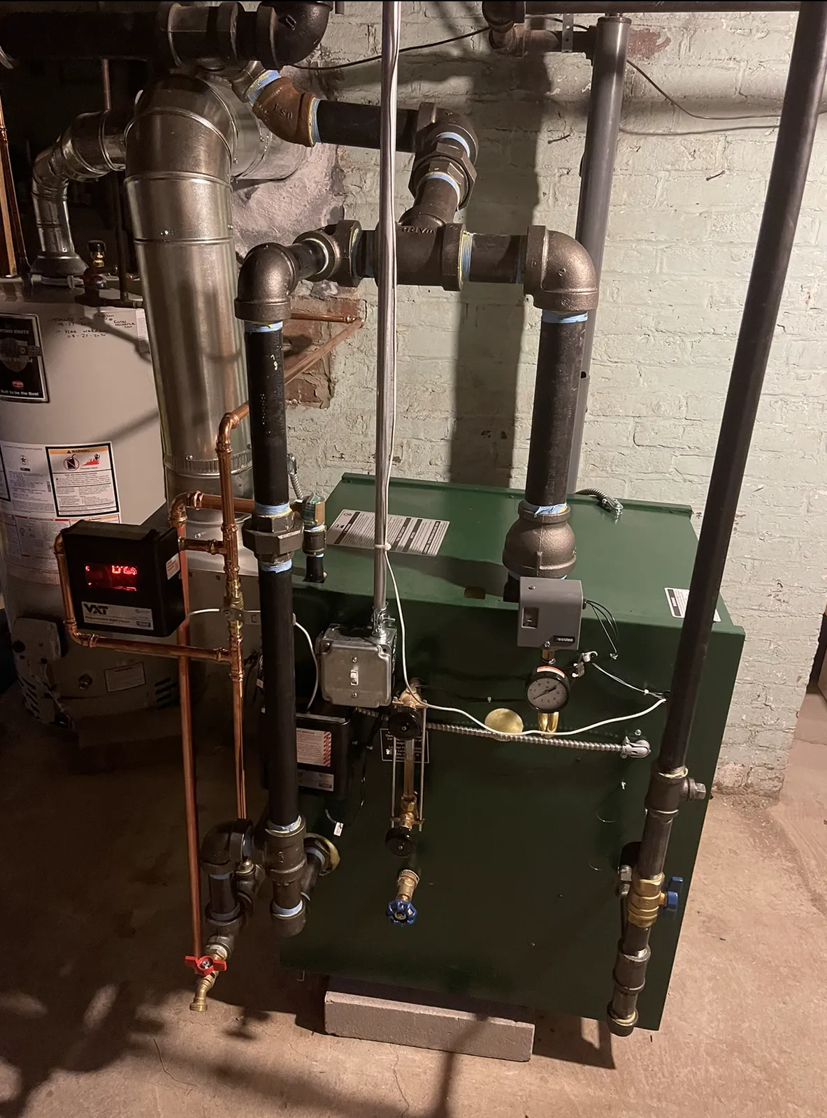 Steam boiler installation with new near-boiler piping