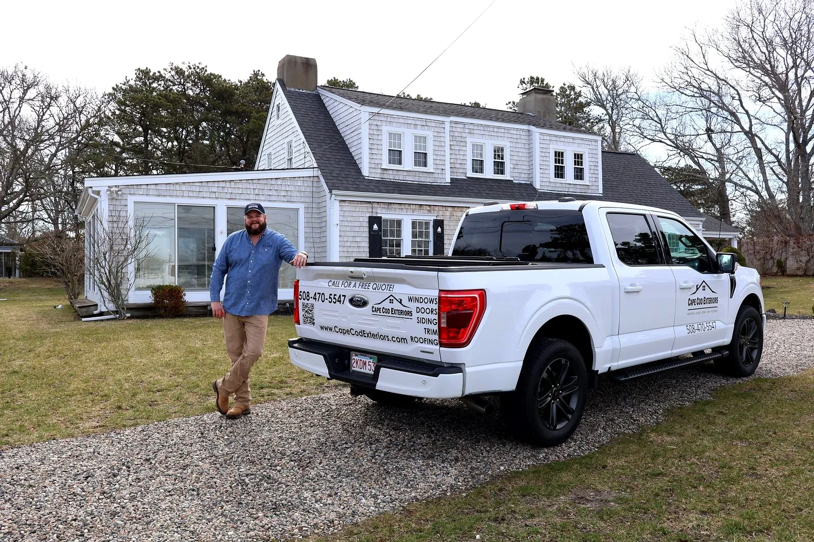 Cape Cod Exteriors founder with company truck at Cape Cod home