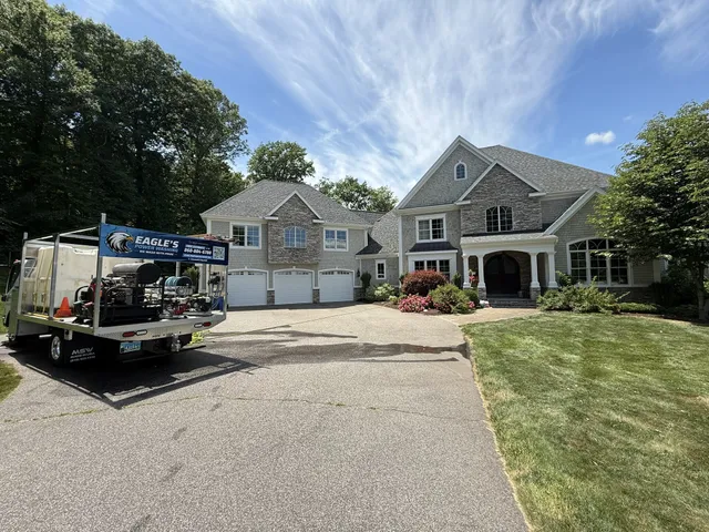 Eagle's Power Washing truck parked at a large Connecticut colonial home, ready for a soft wash