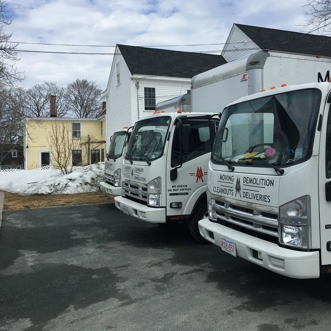 Three box trucks on site