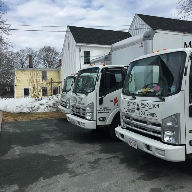 Three box trucks on site