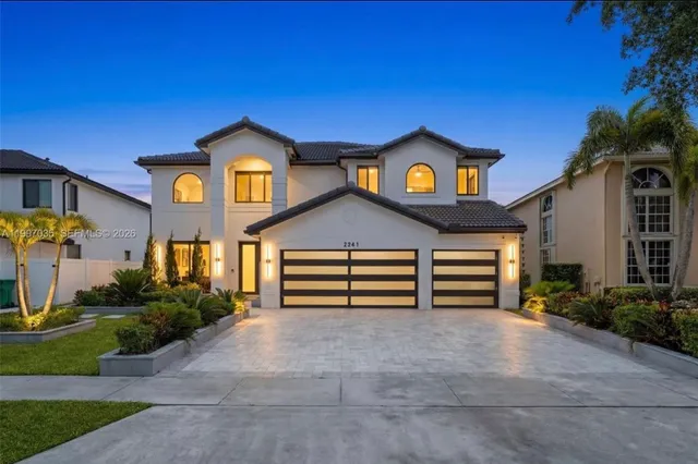 Featured residential project exterior at dusk