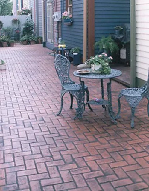 Brick-pattern stamped concrete courtyard patio