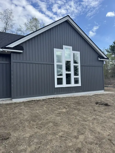 Windows and siding on a completed exterior