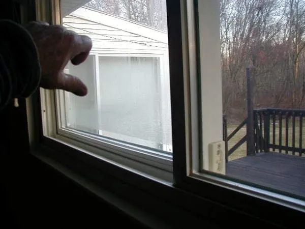 Window,rear bedroom,fogged