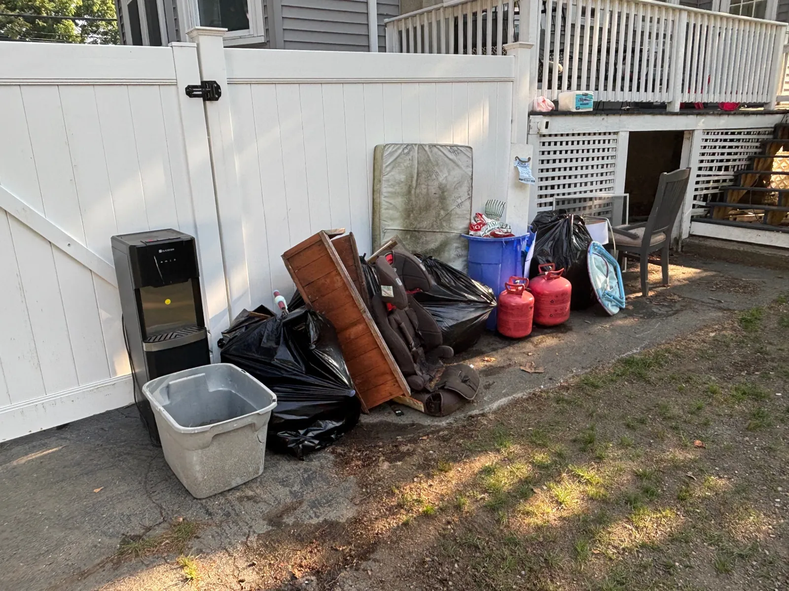 Driveway Junk Pile Cleanup — before