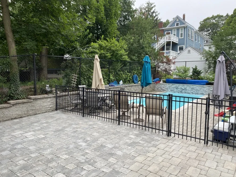 Hardscaping Patio and Wall by Lawn Care Plus