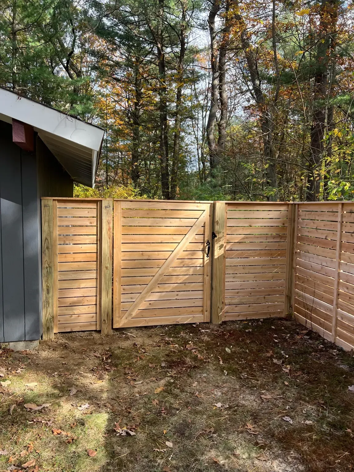 Custom horizontal wood privacy fence and gate