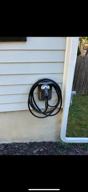 EV charger installed on a home exterior