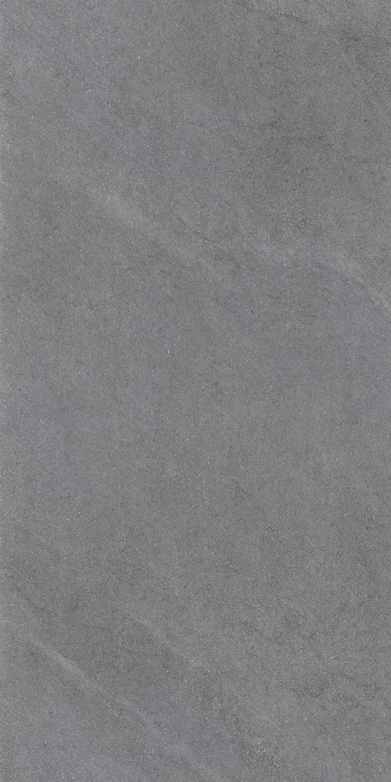 a grey surface with small specks